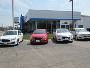 Lineup of Chevrolet cars outside of a dealership